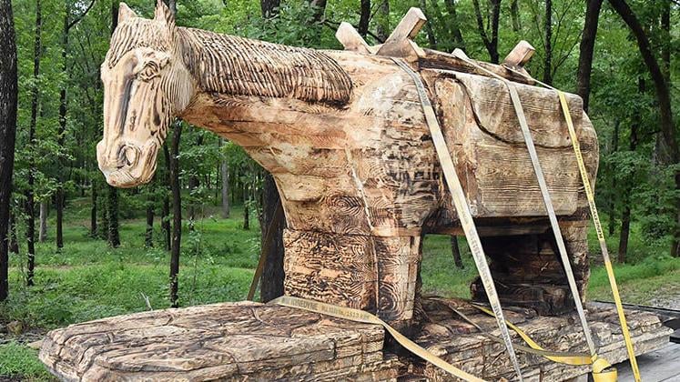 Photo Gallery: Sgt. Reckless --  5000 lb. carved wooden statue -- arrives at Camp McClellan Horse Trails